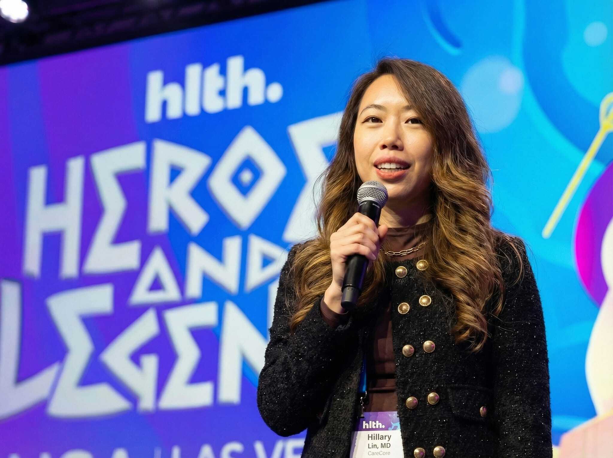 Hillary Lin, MD speaking with a microphone at HLTH 2025