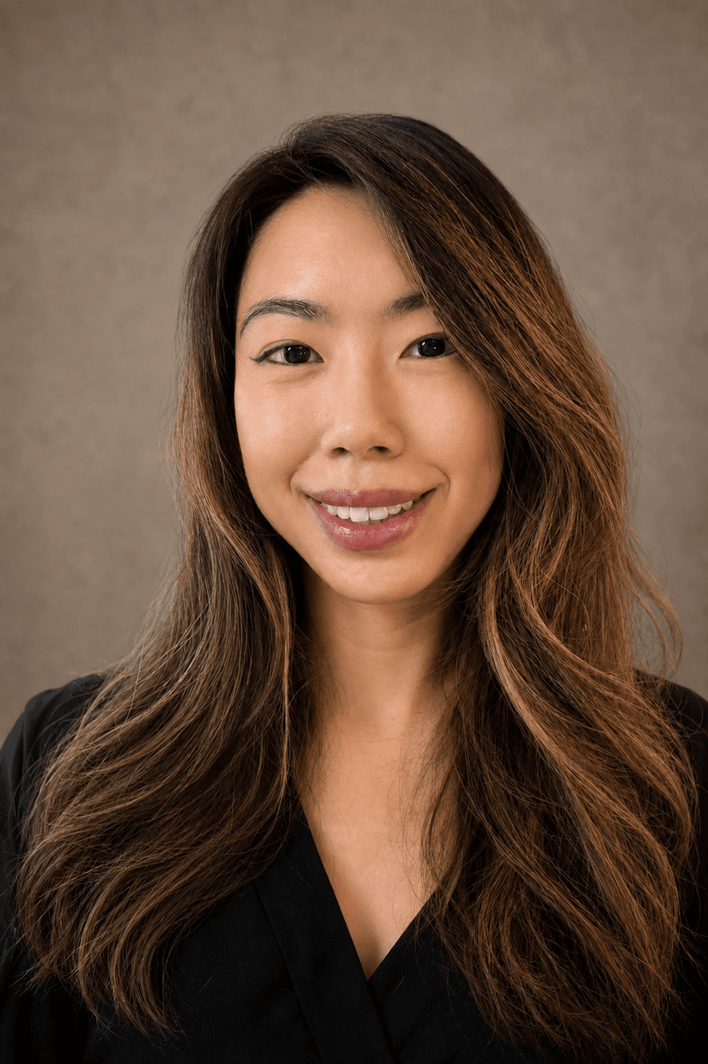 Hillary Lin, MD in a natural studio headshot wearing a black top