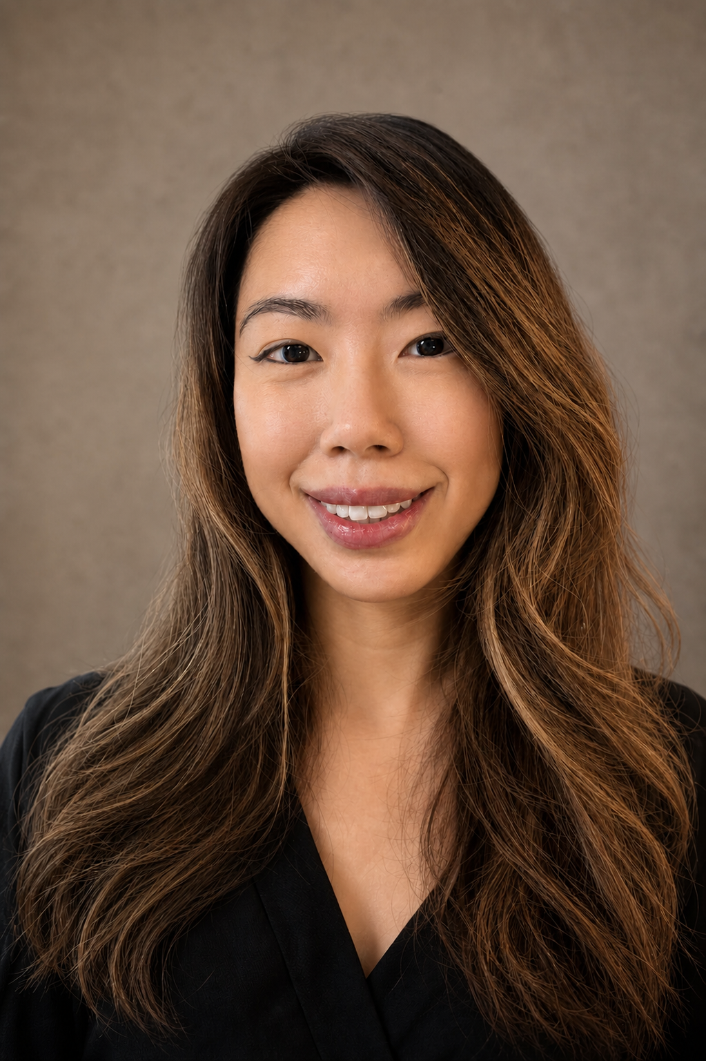 Hillary Lin, MD in a natural studio headshot wearing a black top